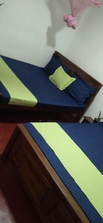 Postel nebo postele na pokoji v ubytování Impress Holiday Home