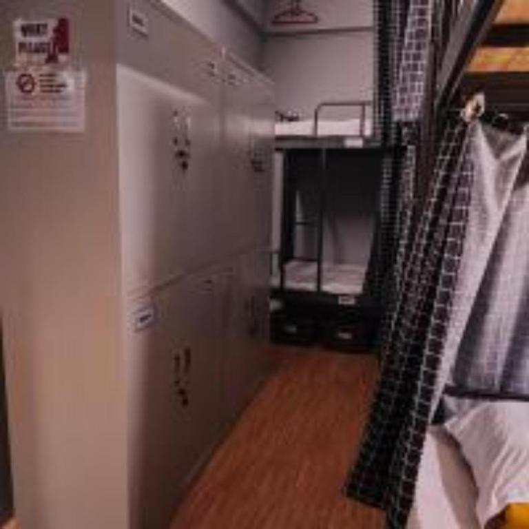 Postel nebo postele na pokoji v ubytování Sabai Sabai Guesthouse in Bayan Lepas
