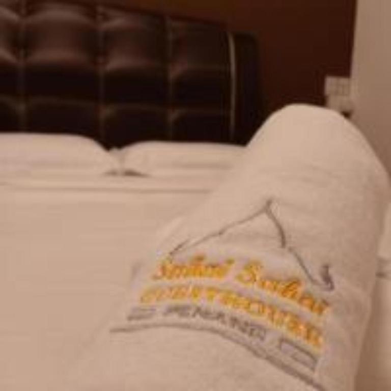 Postel nebo postele na pokoji v ubytování Sabai Sabai Guesthouse in Bayan Lepas