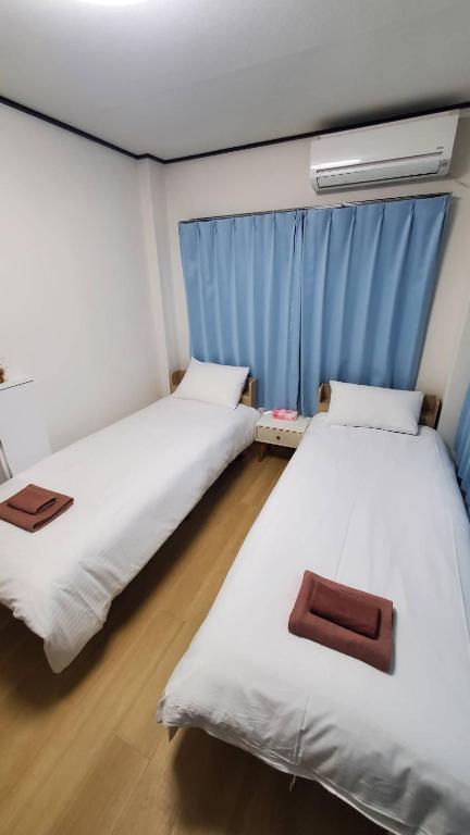Postel nebo postele na pokoji v ubytování Uhome Tabata Apartment