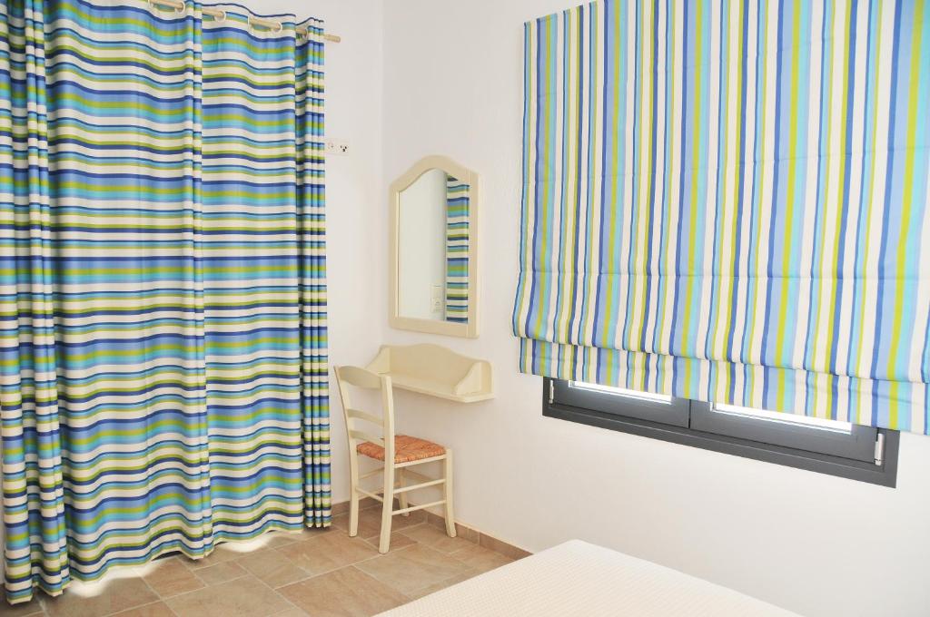 Łóżko lub łóżka w pokoju w obiekcie Kleopatra Villas - Seaside Suites