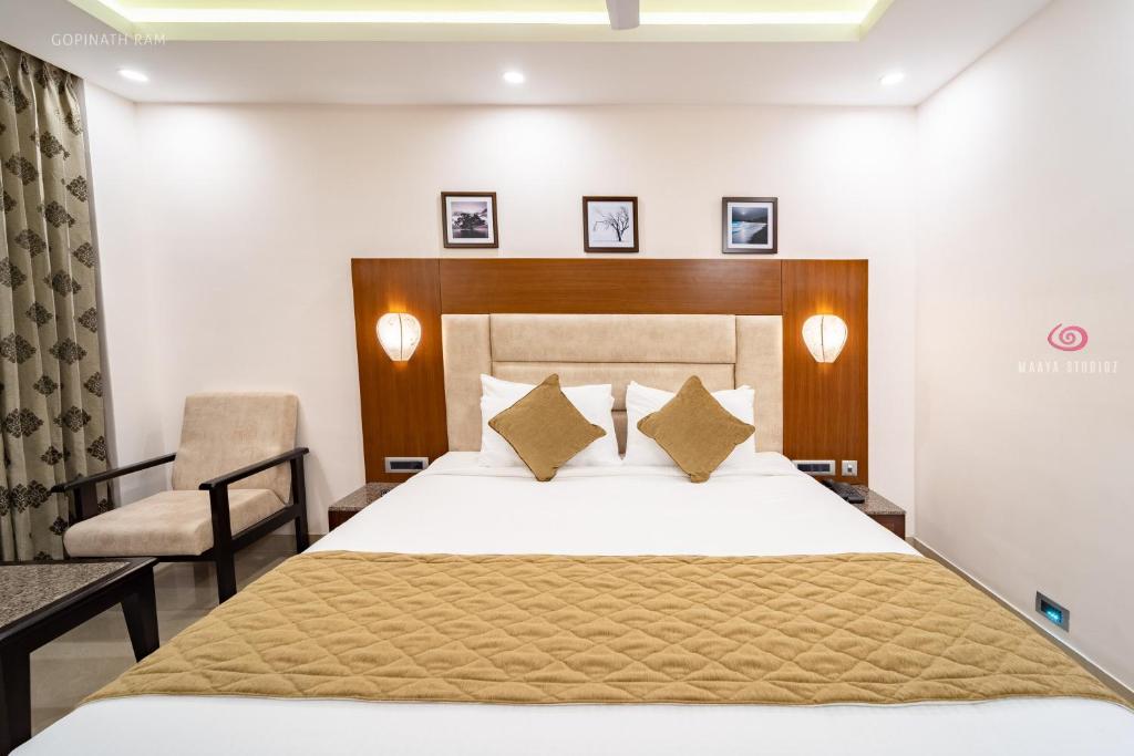 Postel nebo postele na pokoji v ubytování La Grrande Malar - The Boutique Hotel Pondicherry