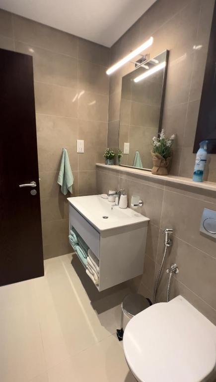 Koupelna v ubytování Lotus Apartment Hawana Salalah