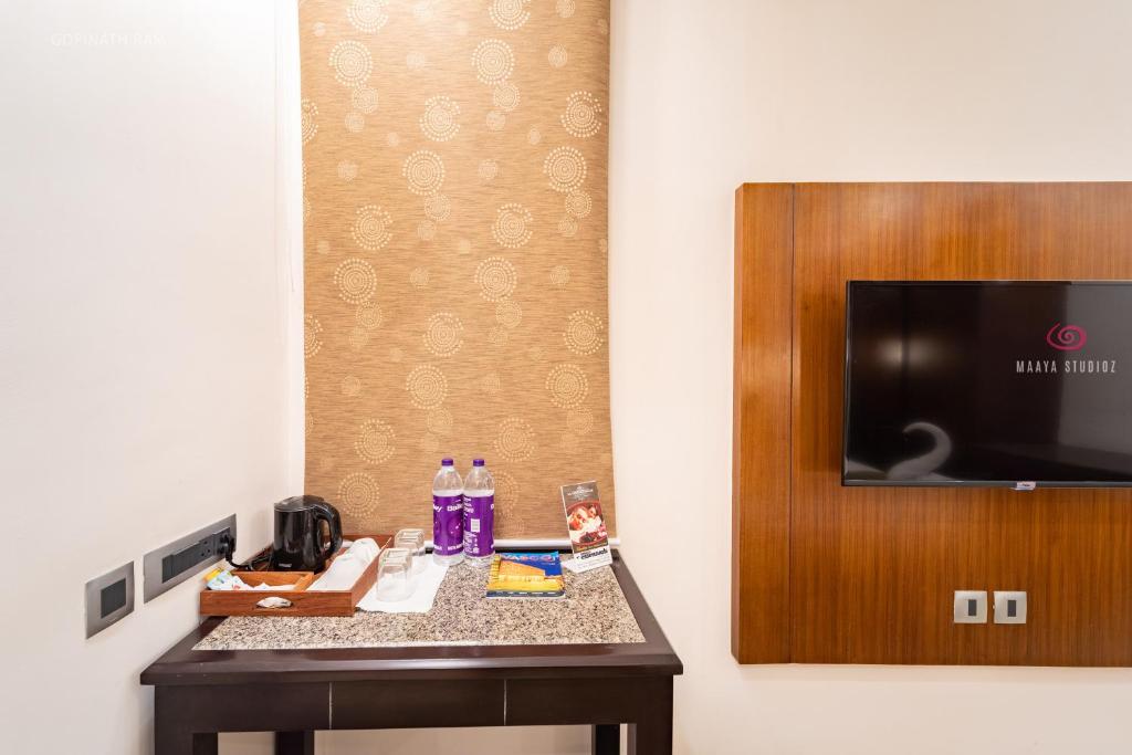 TV a/nebo společenská místnost v ubytování La Grrande Malar - The Boutique Hotel Pondicherry