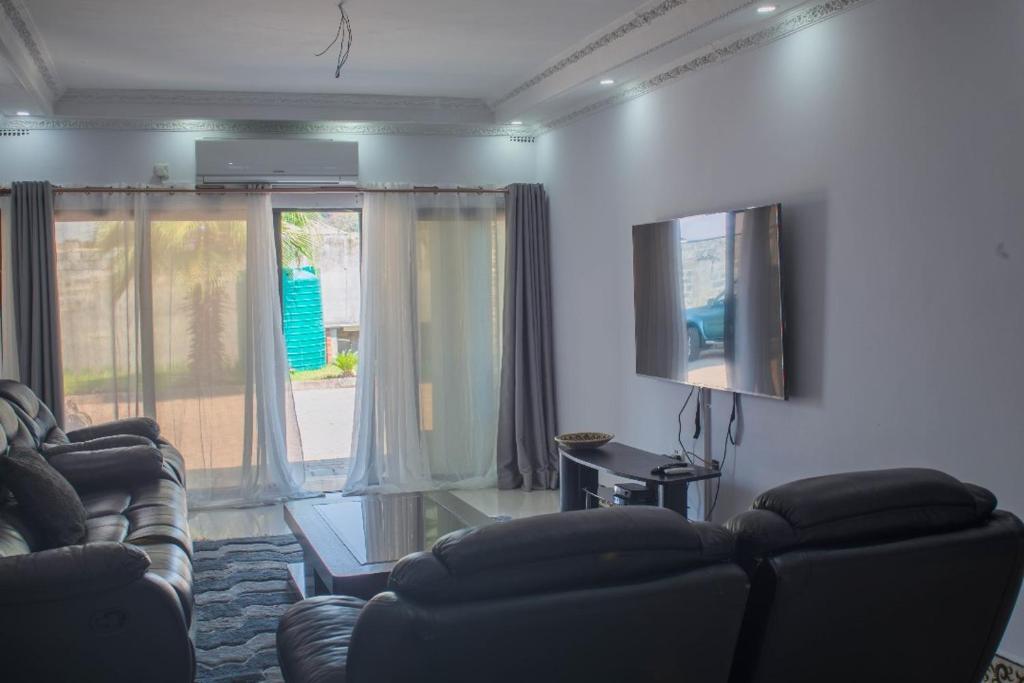 Posezení v ubytování Kachimam Homes