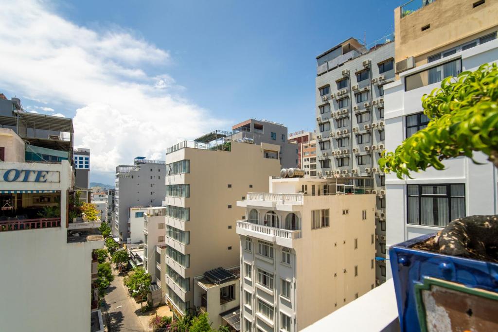 a view of a city with tall buildings at Trang Ngan Hotel by THG in Danang