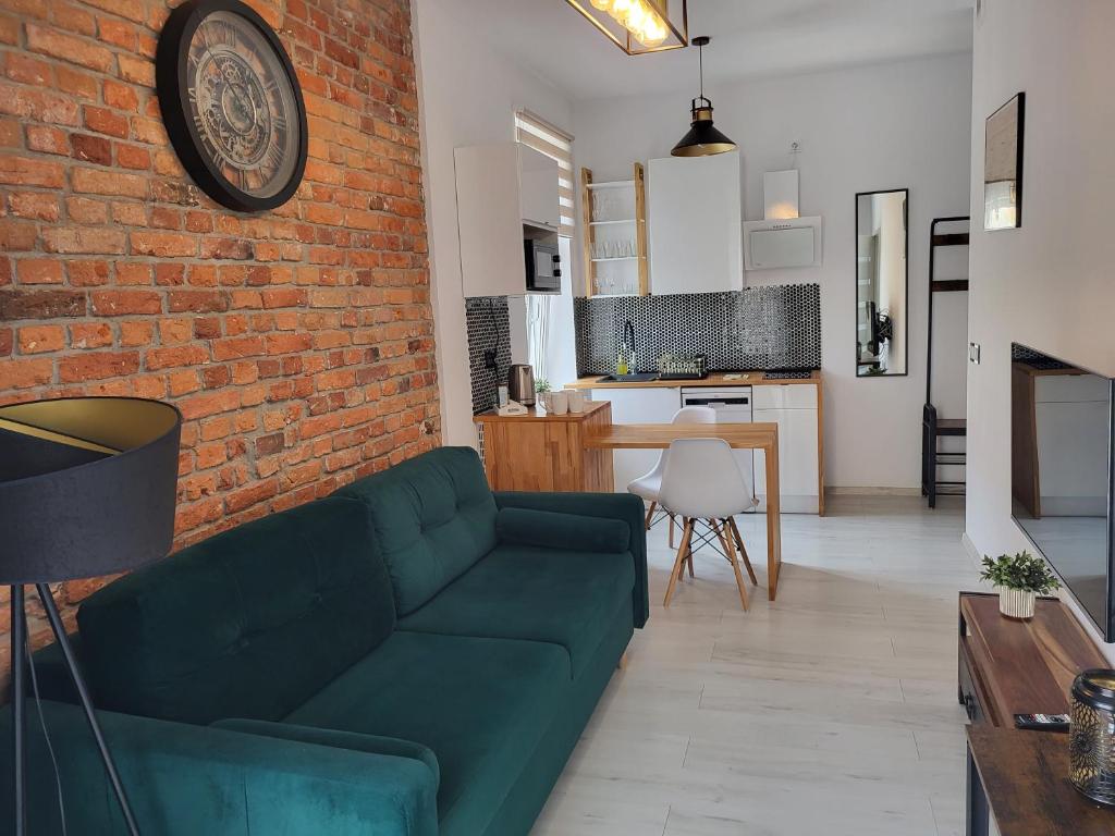 Χώρος καθιστικού στο Apartament-Studio 1 Gliwice z balkonem