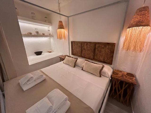 Postel nebo postele na pokoji v ubytování Rada room&suite