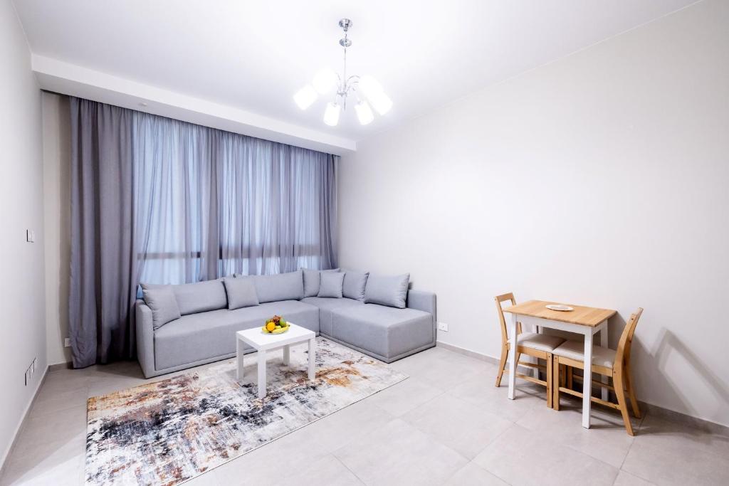 Posezení v ubytování VESTA - El Sheikh Zayed Residence