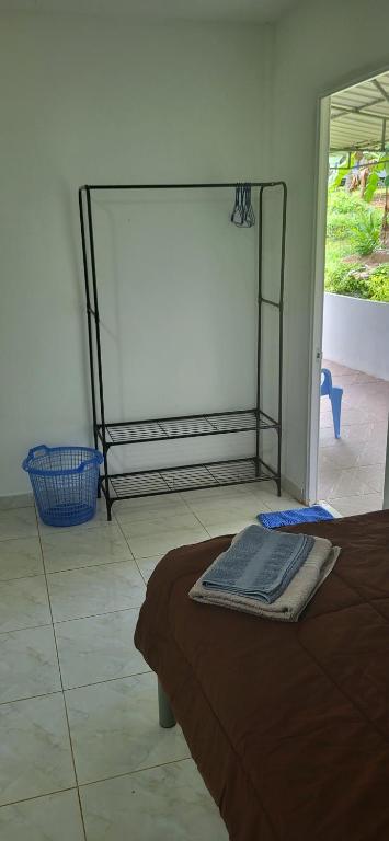 Postel nebo postele na pokoji v ubytování Corsita Resort Koh Mak