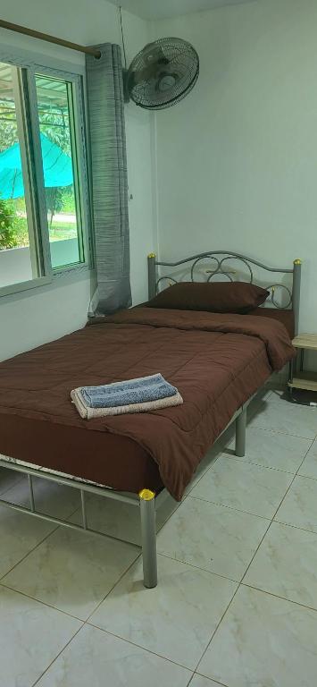 Postel nebo postele na pokoji v ubytování Corsita Resort Koh Mak