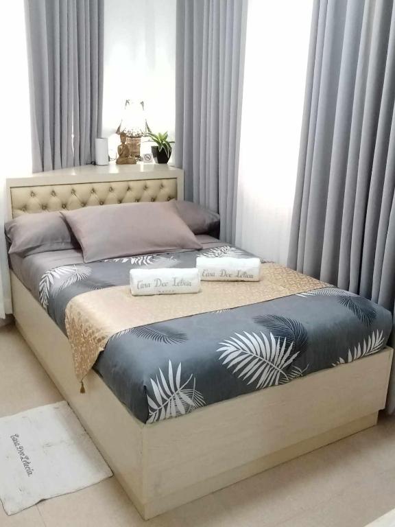 Postel nebo postele na pokoji v ubytování Casa Dee Leticia