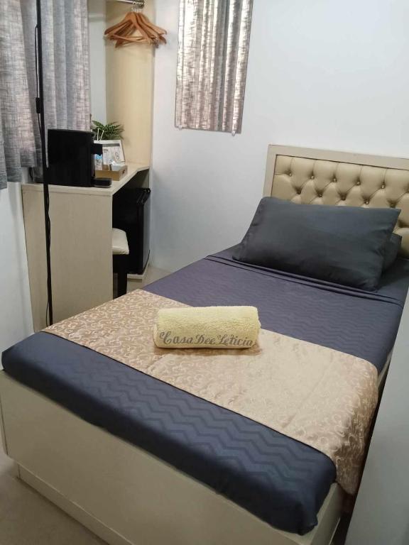 Postel nebo postele na pokoji v ubytování Casa Dee Leticia
