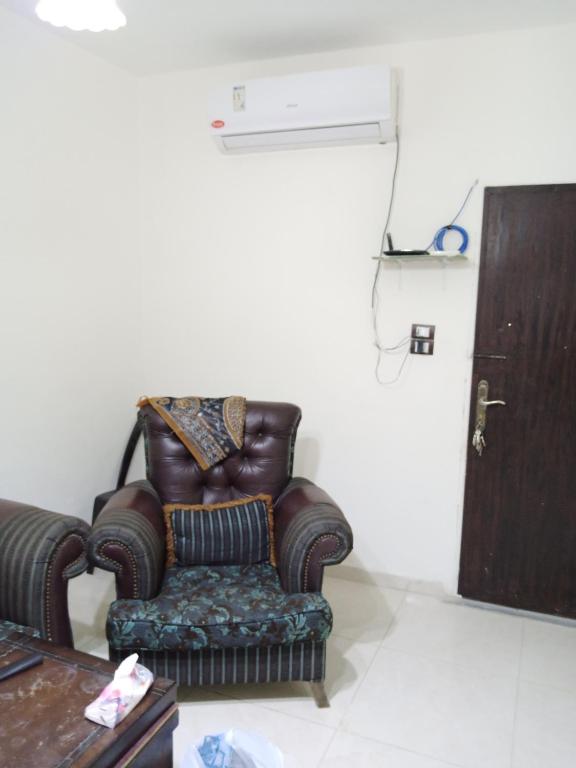 Posezení v ubytování الشقة العائلية الحديثة familial new flat