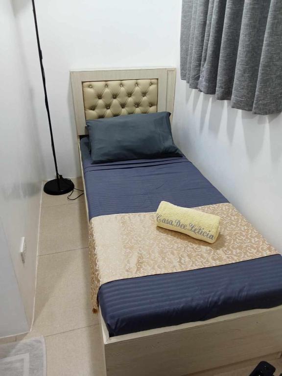 Postel nebo postele na pokoji v ubytování Casa Dee Leticia