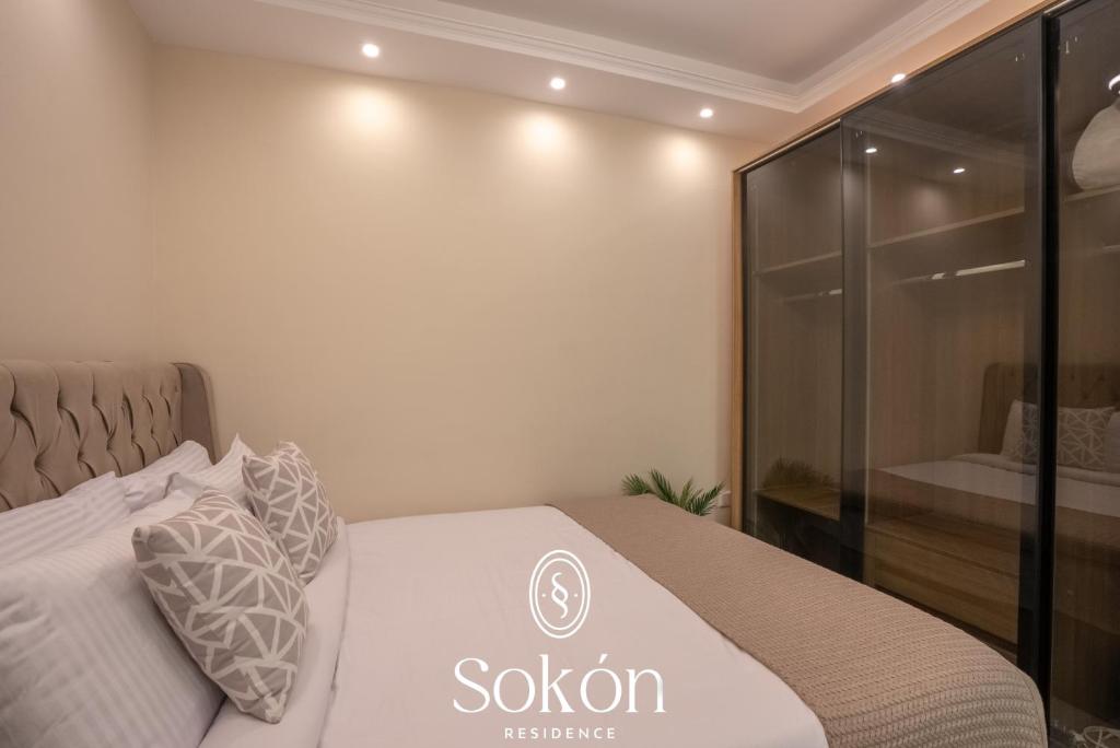 Postel nebo postele na pokoji v ubytování Sokón Residence - Cairo - New Cairo - Madinaty B11