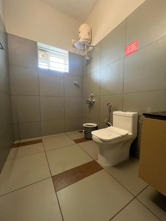 Koupelna v ubytování Away From Home - 4 - Rooms In Ooty, Home Stay Ooty