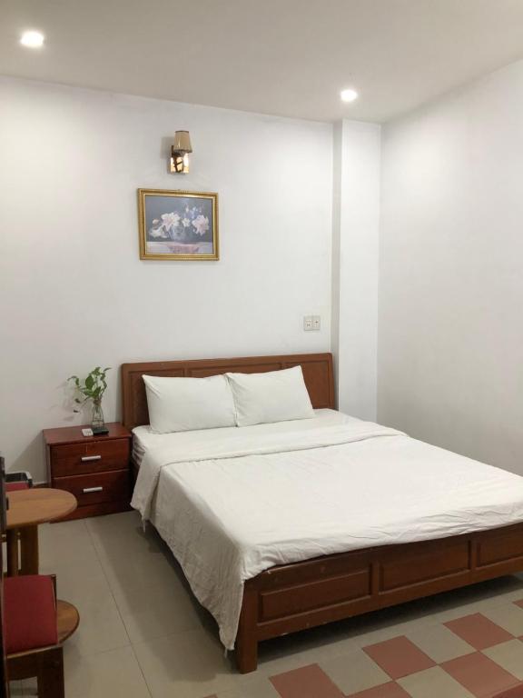 Postel nebo postele na pokoji v ubytování Motel Minh Thảo