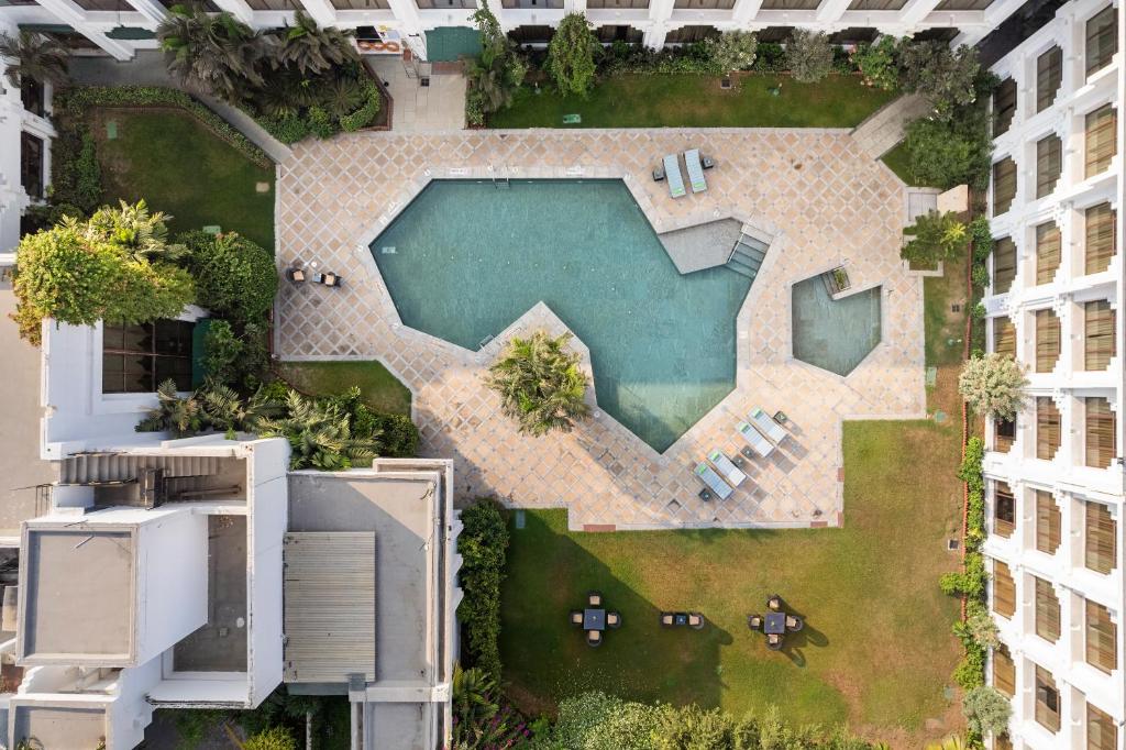 Bazén v ubytování Welcomhotel by ITC Hotels, Alkapuri, Vadodara nebo v jeho okolí