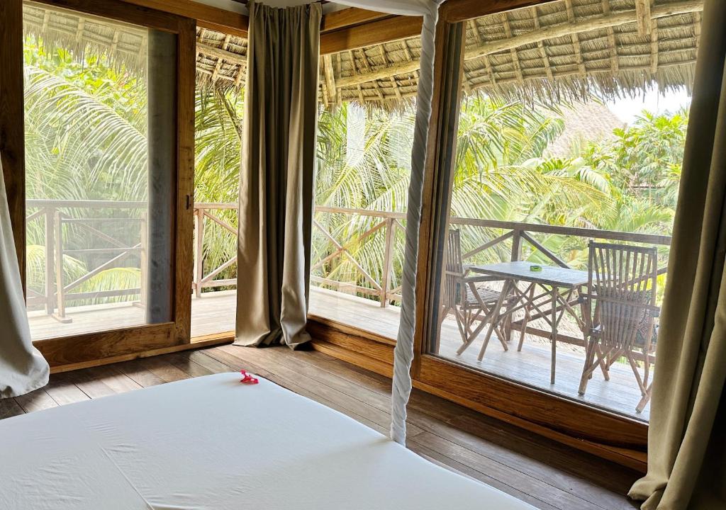 Ein Balkon oder eine Terrasse in der Unterkunft Maisha Nungwi - Boutique Hotel