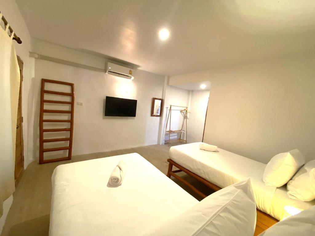 Postel nebo postele na pokoji v ubytování Ubox Samui Hostel - Chaweng beach