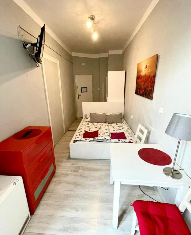Posteľ alebo postele v izbe v ubytovaní Colourful Rooms Wrocław