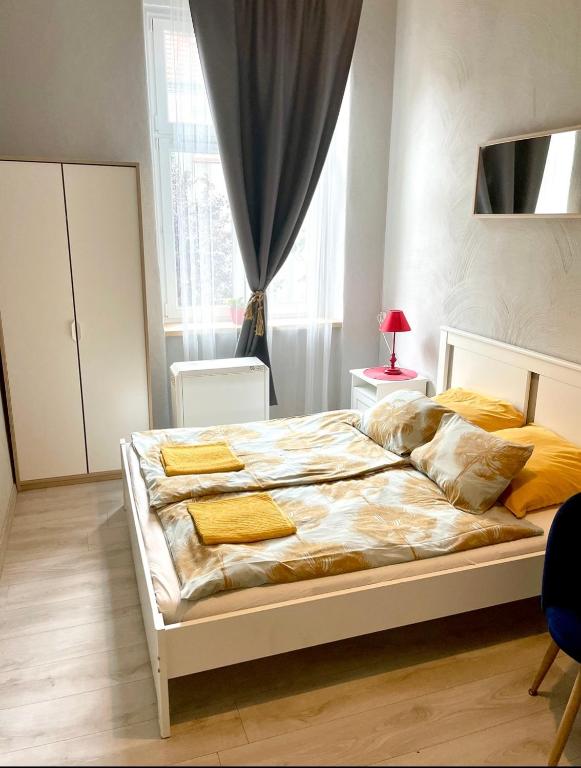 Posteľ alebo postele v izbe v ubytovaní Colourful Rooms Wrocław