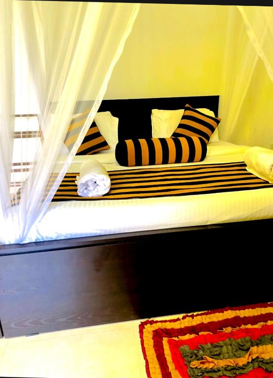 Postel nebo postele na pokoji v ubytování Sadew Home Stay