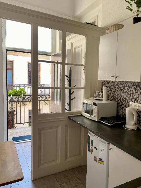 A kitchen or kitchenette at Astoria