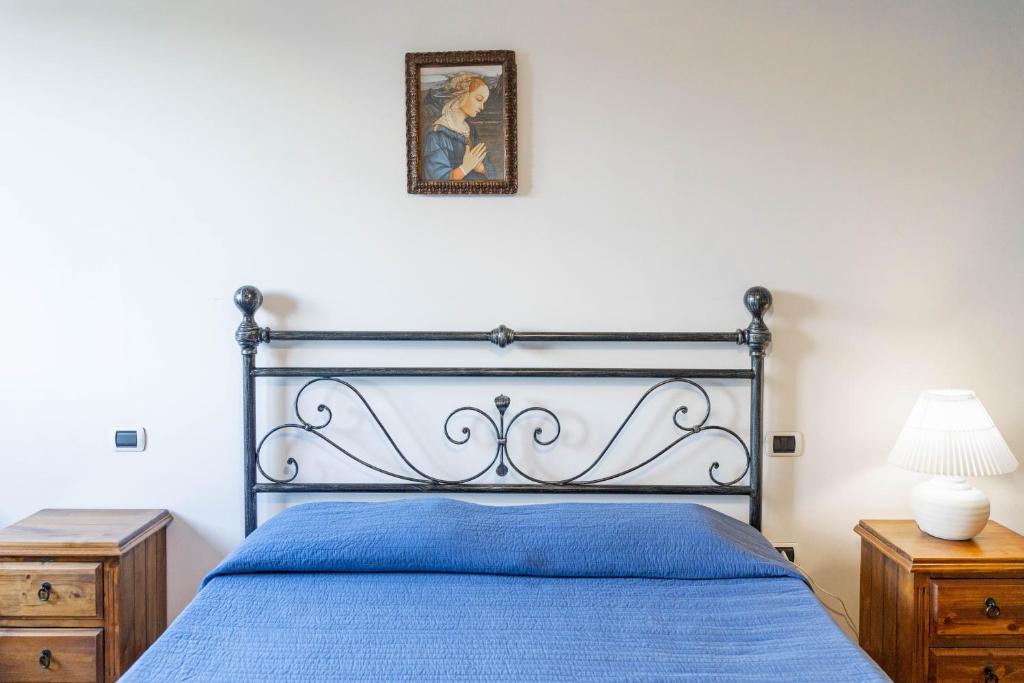 Postel nebo postele na pokoji v ubytování Agriturismo B&B La Sterpina