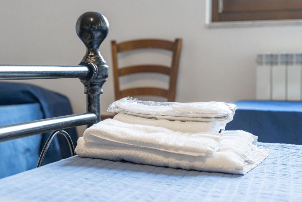 Postel nebo postele na pokoji v ubytování Agriturismo B&B La Sterpina