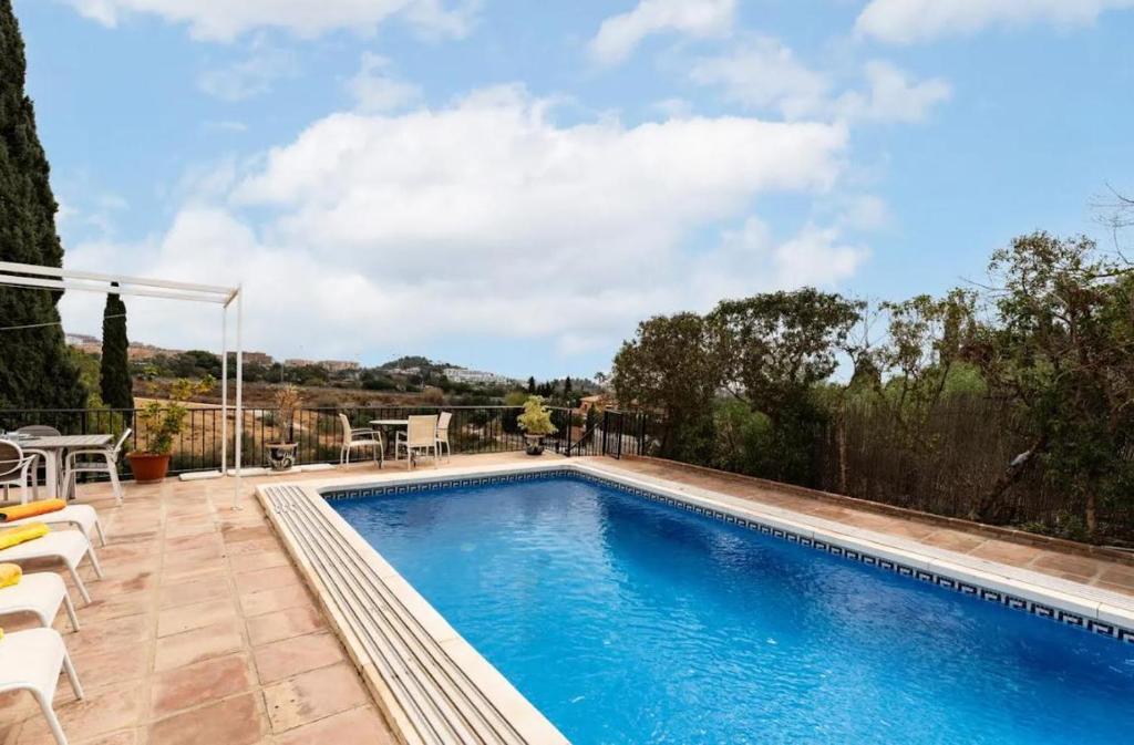 Bazén v ubytovaní Villa Vista Verde -Sea views -3 Bedrooms -Heated Pool alebo v jeho blízkosti