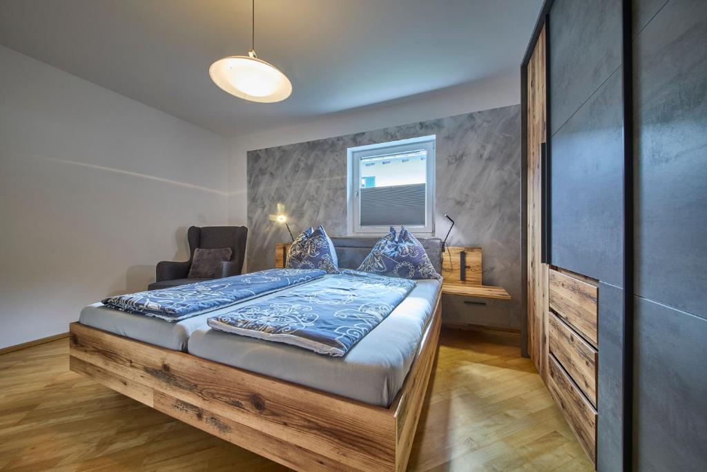 Postel nebo postele na pokoji v ubytování Appartementhaus Goldnugget