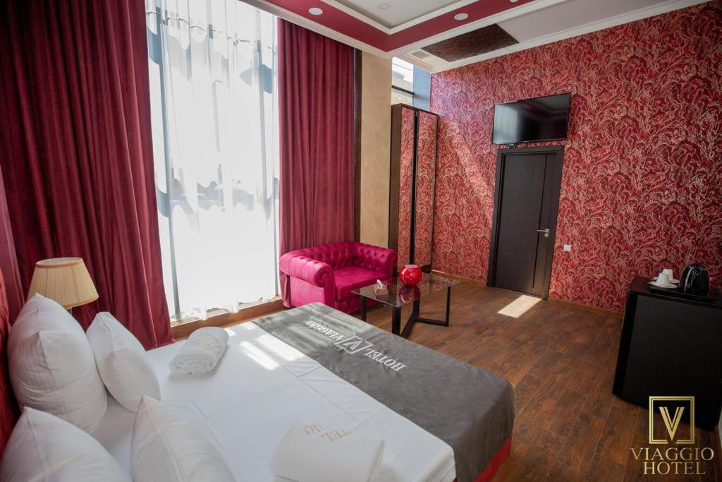 Postel nebo postele na pokoji v ubytování Hotel Viaggio