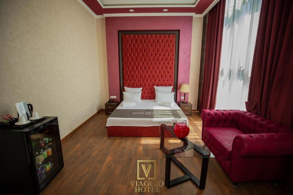Postel nebo postele na pokoji v ubytování Hotel Viaggio
