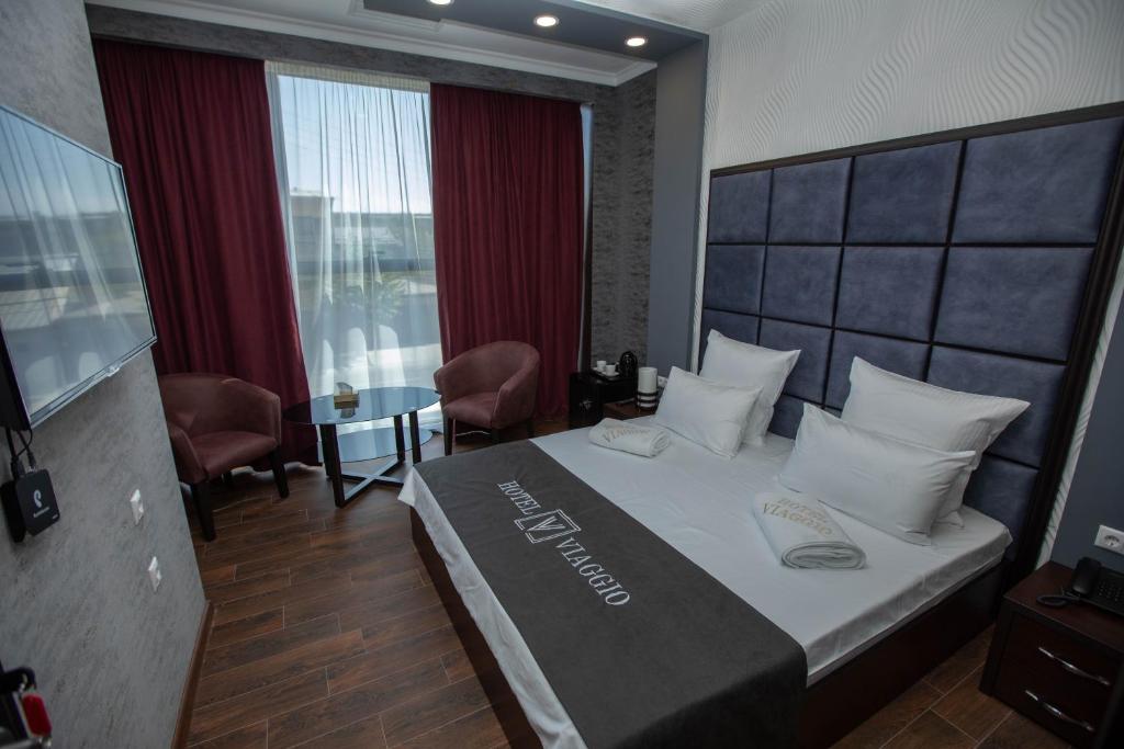 Postel nebo postele na pokoji v ubytování Hotel Viaggio