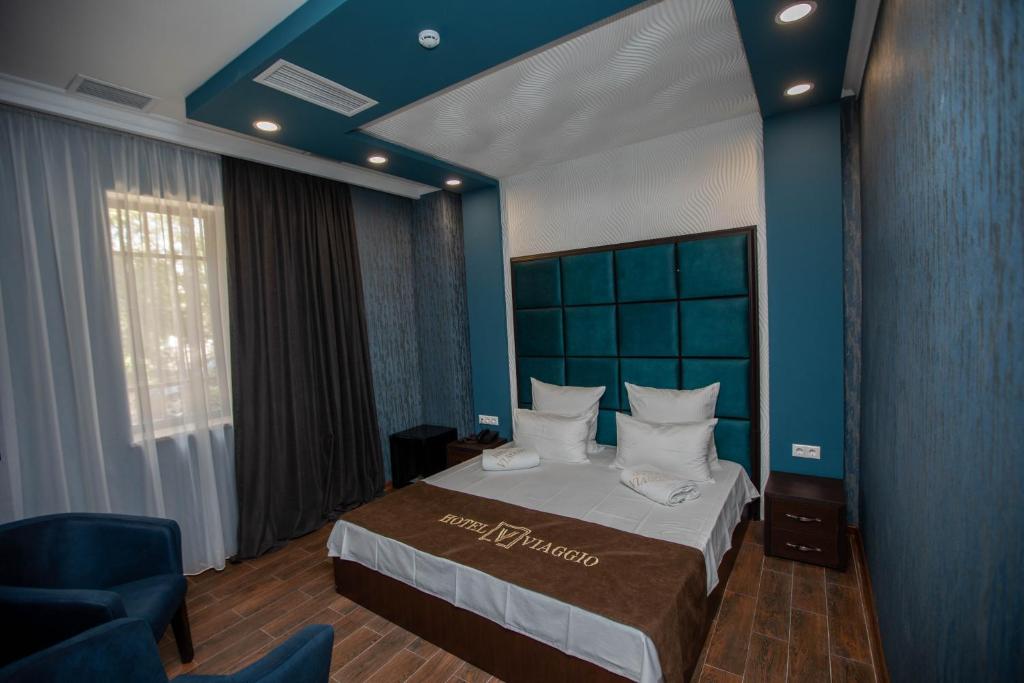 Postel nebo postele na pokoji v ubytování Hotel Viaggio