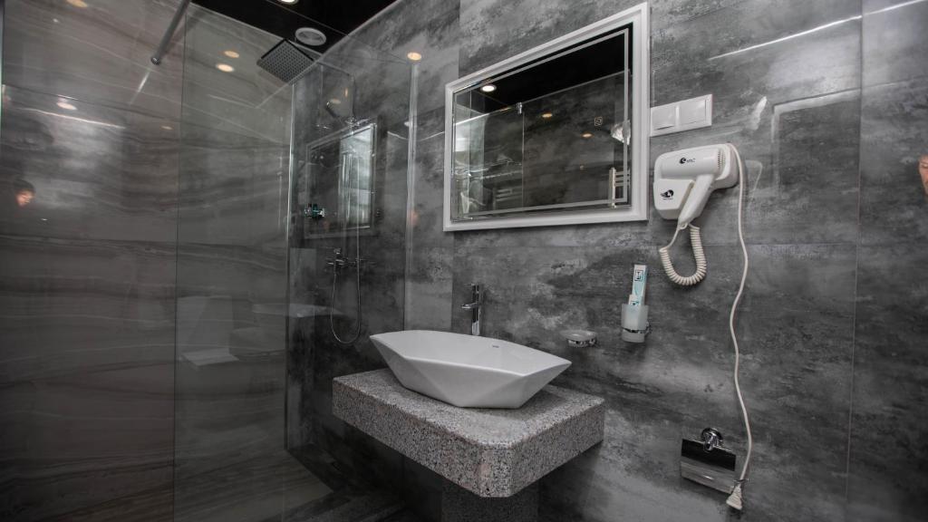 Koupelna v ubytování Hotel Viaggio