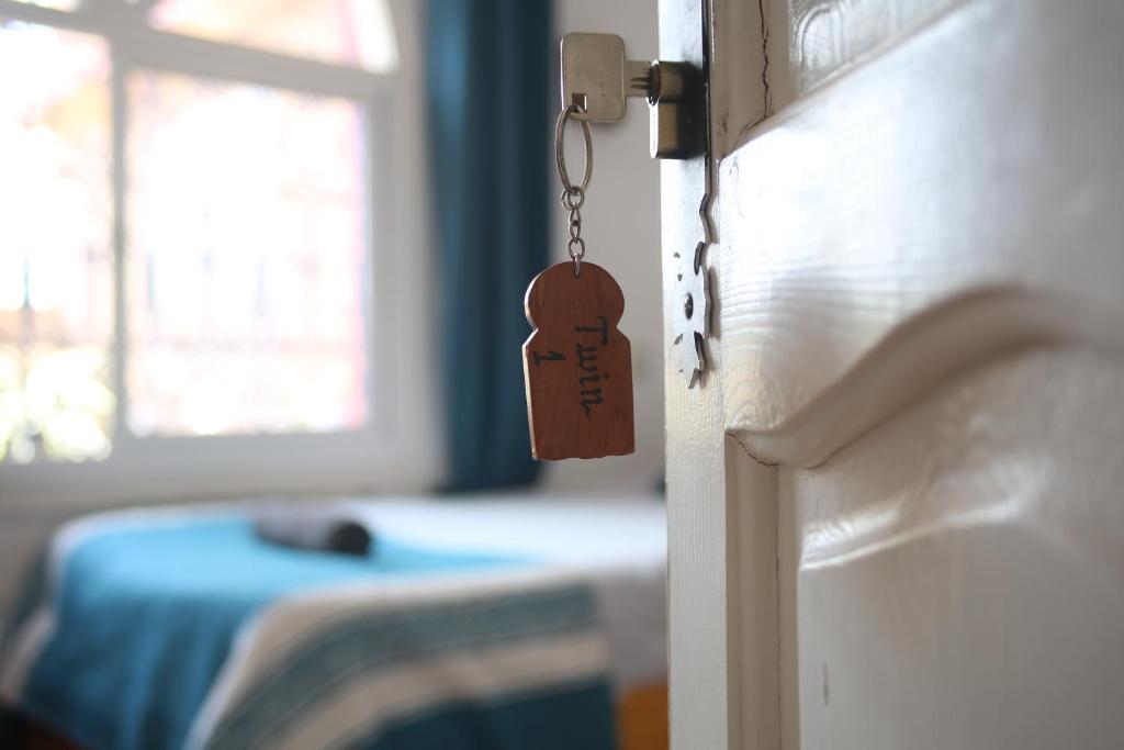 Postel nebo postele na pokoji v ubytování Little Kasbah Surf Camp Imsouane