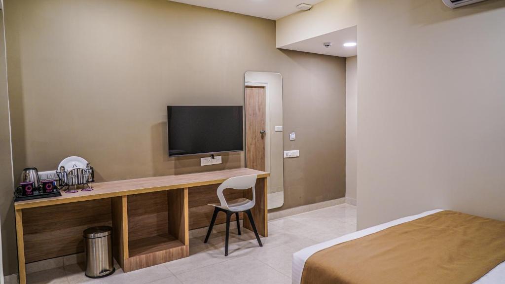 TV a/nebo společenská místnost v ubytování Olive Hotel Millers Road by Embassy Group