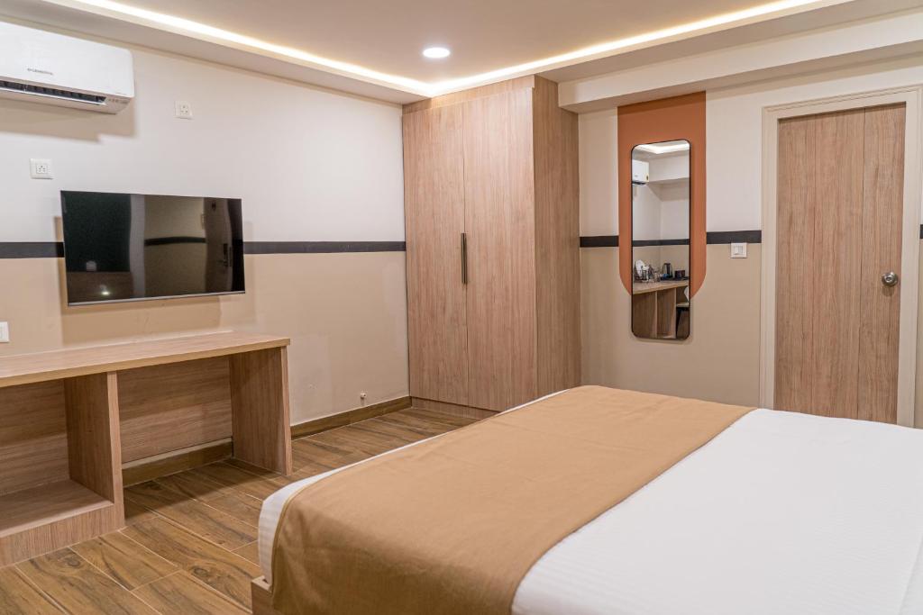 TV a/nebo společenská místnost v ubytování Olive Hotel Millers Road by Embassy Group