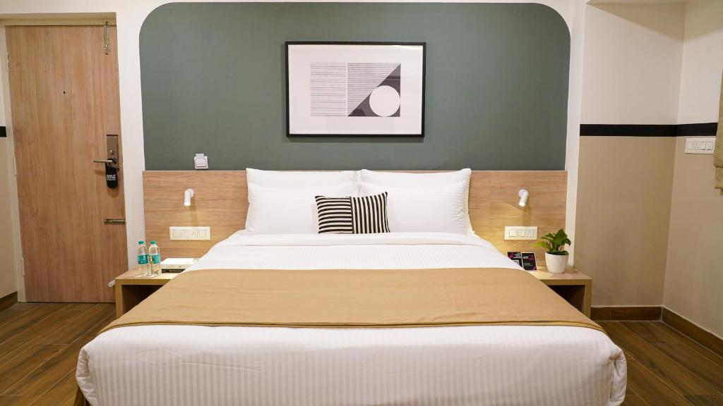 Postel nebo postele na pokoji v ubytování Olive Hotel Millers Road by Embassy Group