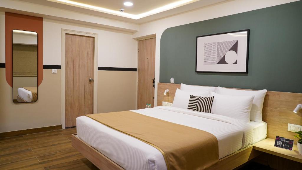Postel nebo postele na pokoji v ubytování Olive Hotel Millers Road by Embassy Group