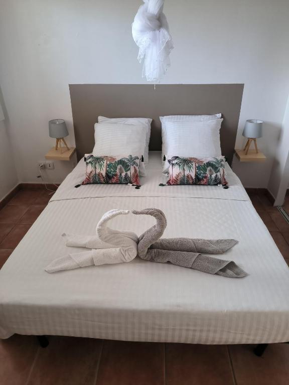Postel nebo postele na pokoji v ubytování Appartement T3 proche de la mer