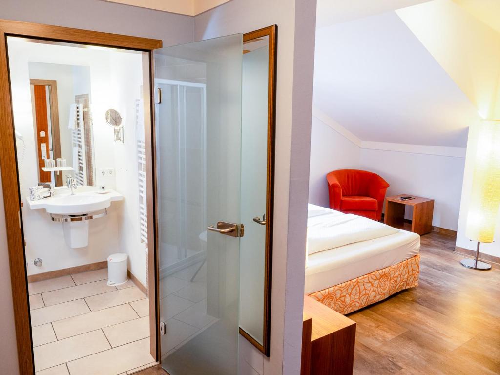 Koupelna v ubytování Hotel Geiger