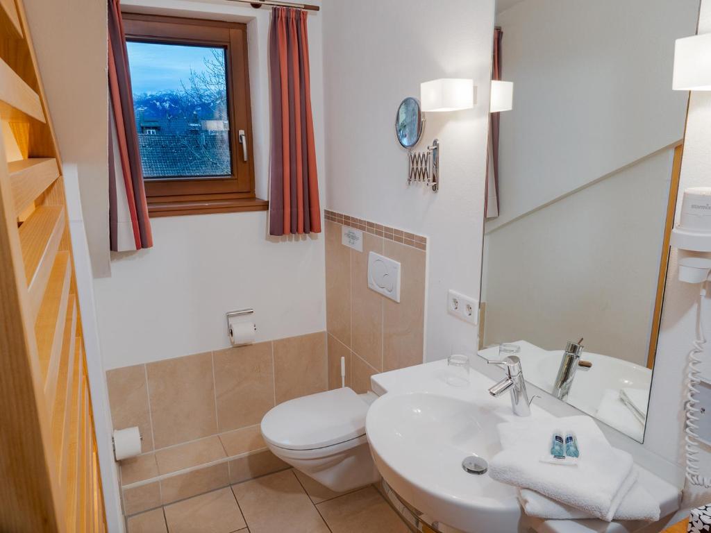 Koupelna v ubytování Hotel Geiger