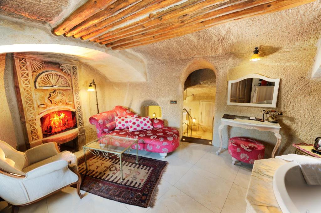 A seating area at Tafoni Houses Cave Hotel