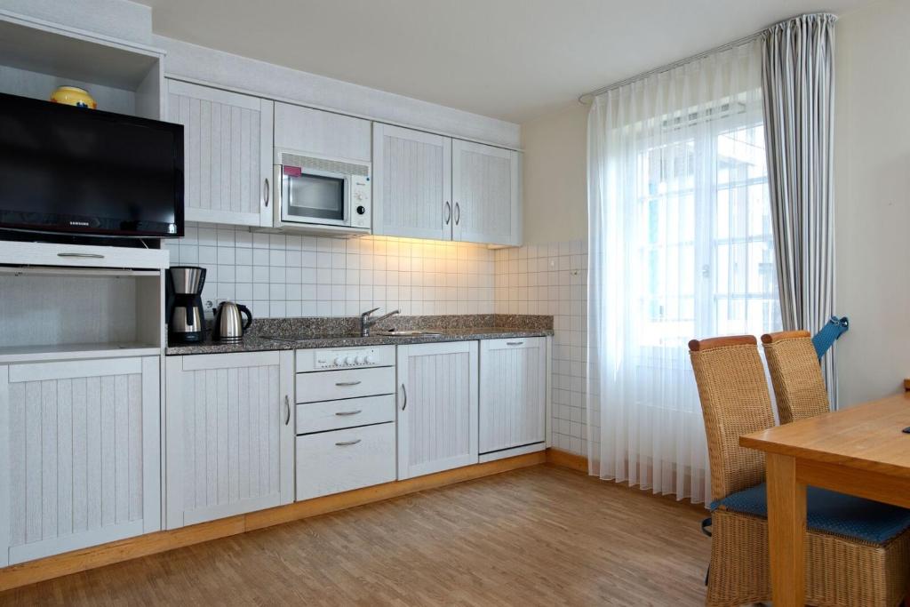 Kuchyň nebo kuchyňský kout v ubytování Hapimag Resort Dünenblick