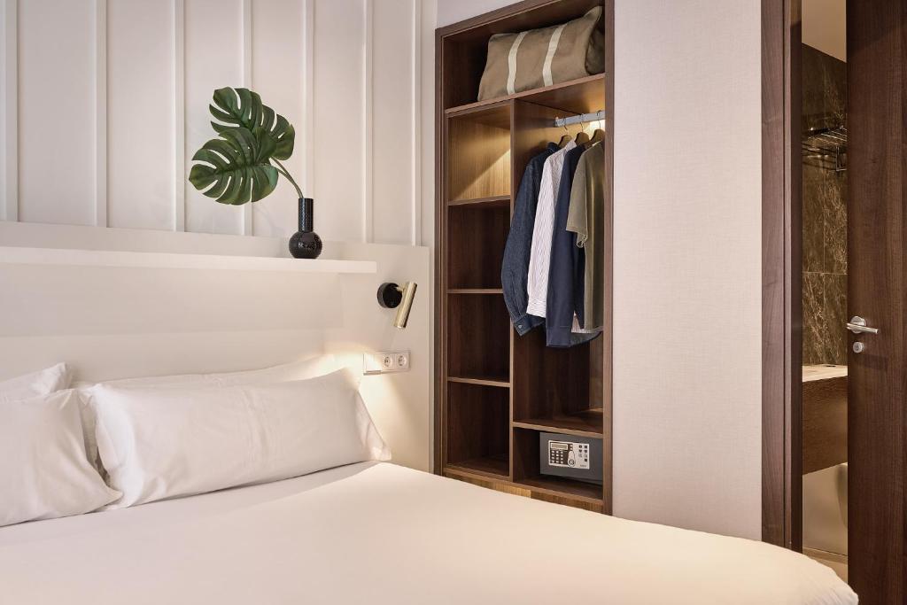 Letto o letti in una camera di Ramirez Flats Valencia