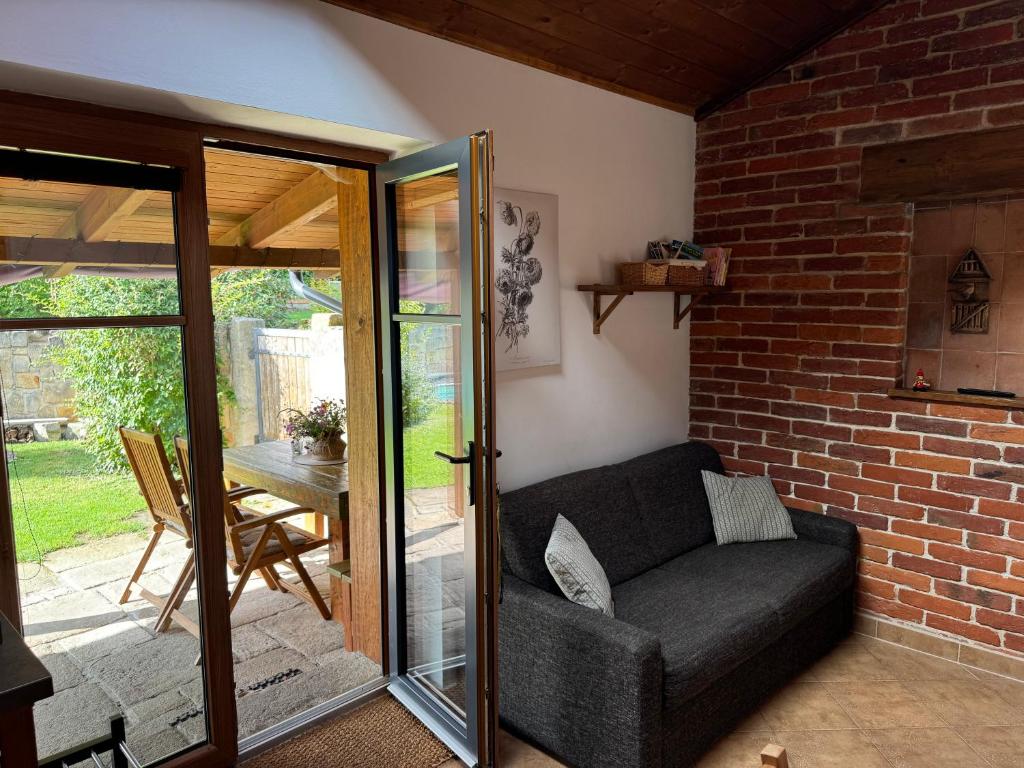Posezení v ubytování Kamenny apartman